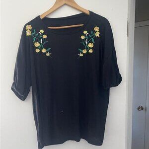 T-shirt with yellow flowers on the top